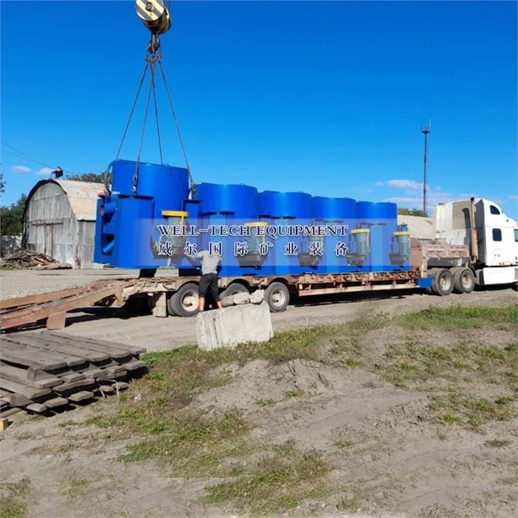 Auto discharge centrifugal concentrator